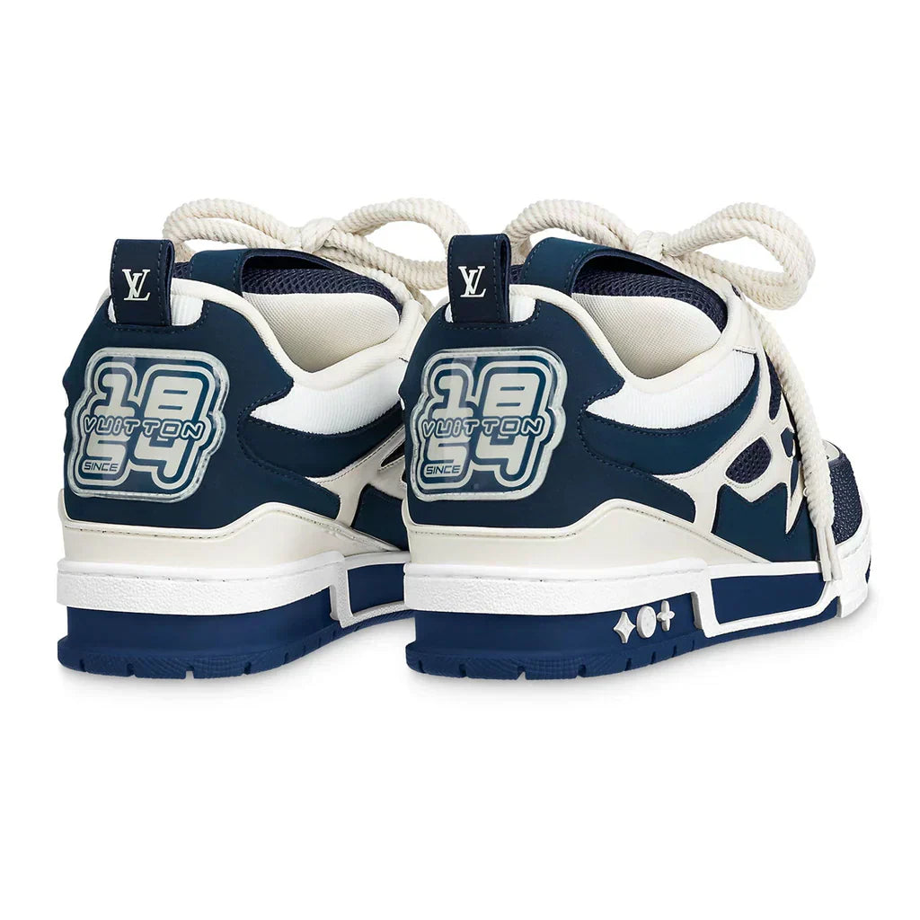 https://cdn.shopify.com/s/files/1/0648/4253/0893/files/Louis-Vuitton-LV-Skate-Sneaker-Marine-White_3.webp?v=1762887086