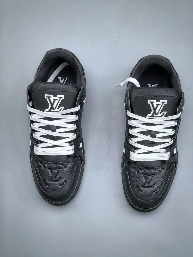 https://cdn.shopify.com/s/files/1/0648/4253/0893/files/LouisVuittonBlackTrainer_4.webp?v=1762887084