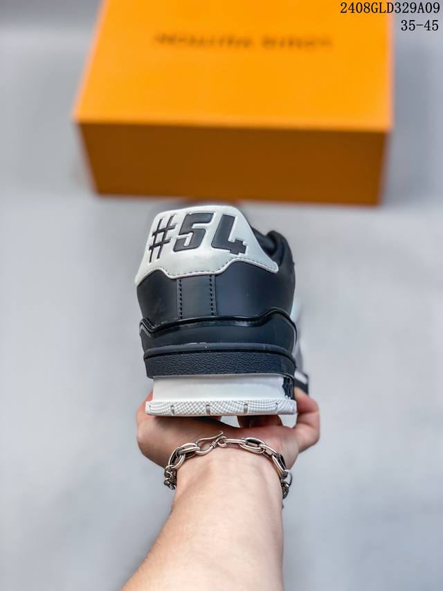 https://cdn.shopify.com/s/files/1/0648/4253/0893/files/LouisVuittonTrainerBlackGraySignature_3.jpg?v=1762887074