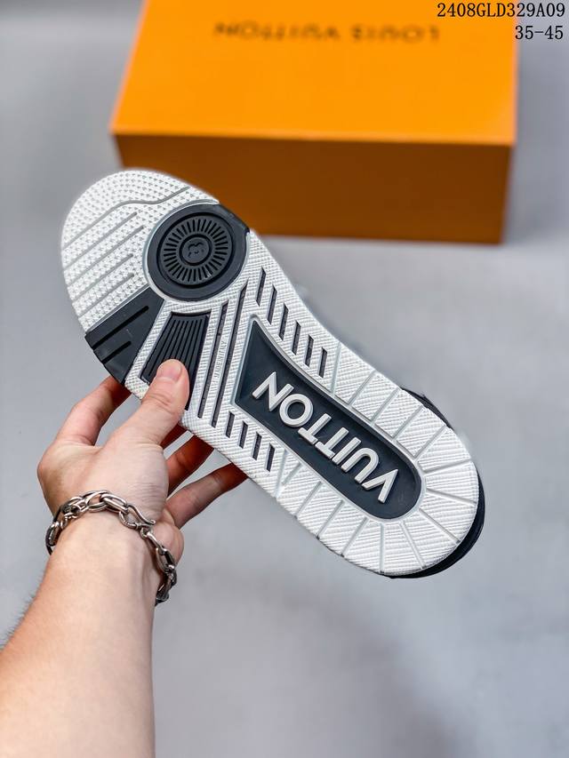 https://cdn.shopify.com/s/files/1/0648/4253/0893/files/LouisVuittonTrainerBlackGraySignature_4.jpg?v=1762887074