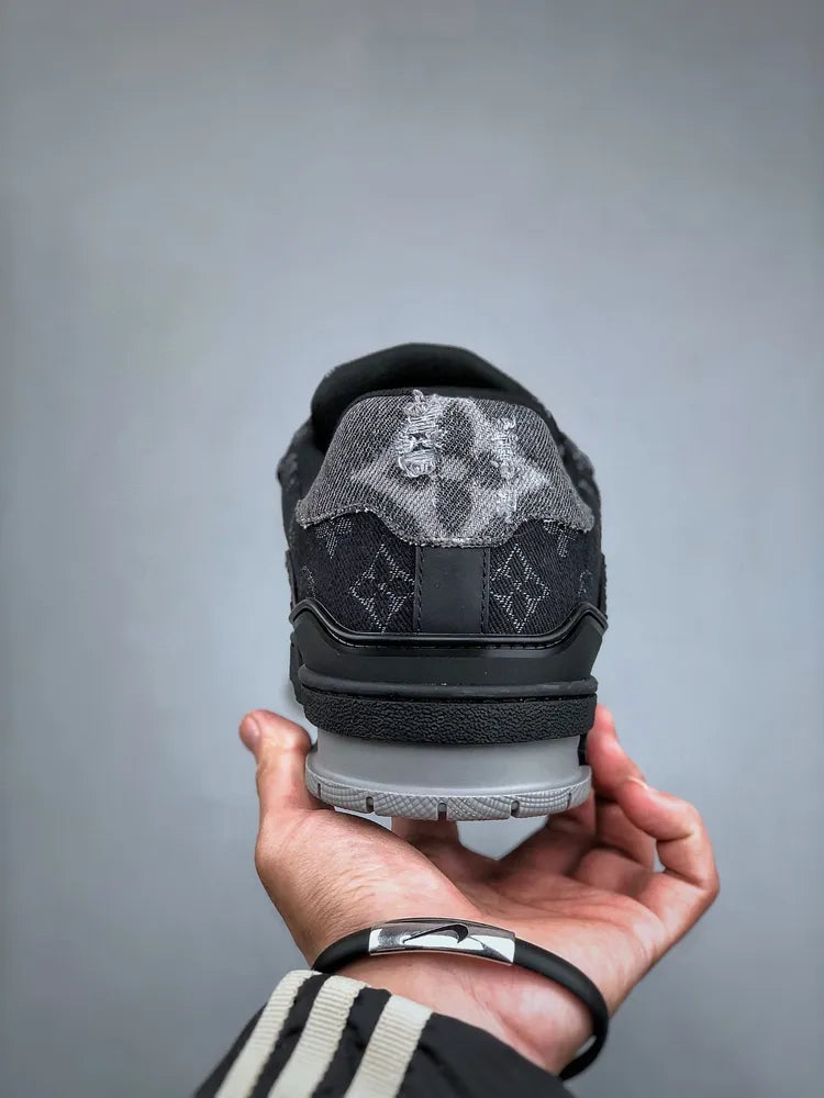 https://cdn.shopify.com/s/files/1/0648/4253/0893/files/LouisVuittonTrainerBlackGreyDenimMonogram_5.webp?v=1762887588