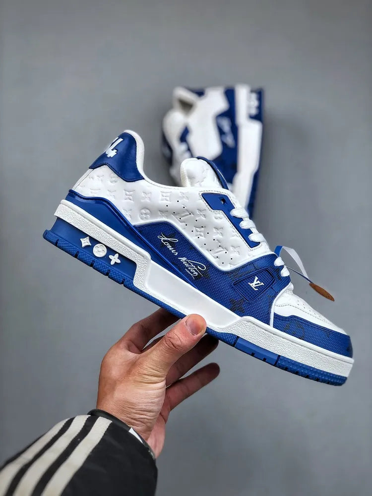https://cdn.shopify.com/s/files/1/0648/4253/0893/files/LouisVuittonTrainer_54SignatureBlueWhite_5.webp?v=1762887083