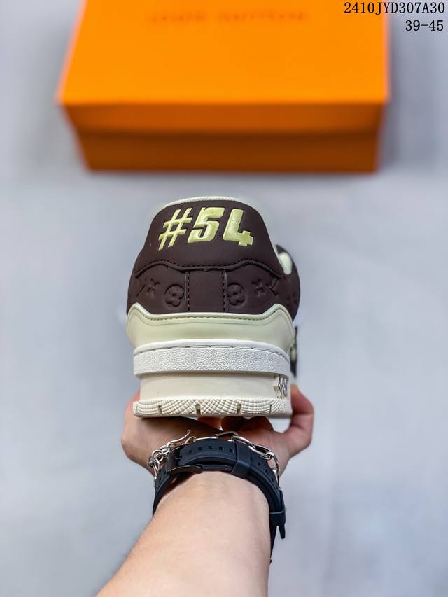 https://cdn.shopify.com/s/files/1/0648/4253/0893/files/LouisVuittonbyTyler_theCreatorLVTrainerMocha_3.jpg?v=1762887590