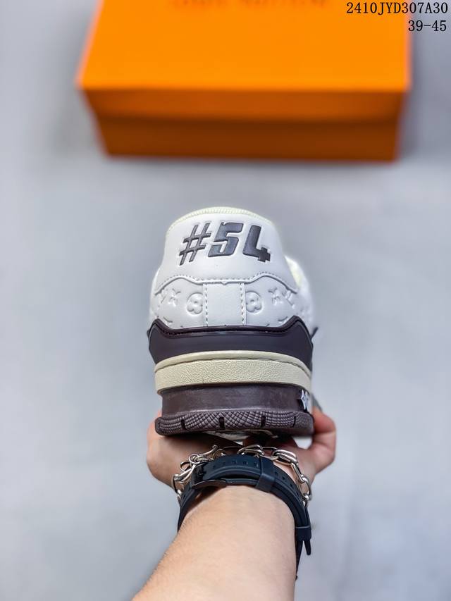 https://cdn.shopify.com/s/files/1/0648/4253/0893/files/LouisVuittonbyTyler_theCreatorLVTrainerWhiteMocha_2.jpg?v=1762887082