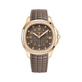 https://cdn.shopify.com/s/files/1/1016/2169/4801/files/Patek-Philippe-Aquanaut-5268-200R-010.jpg?v=1770279920