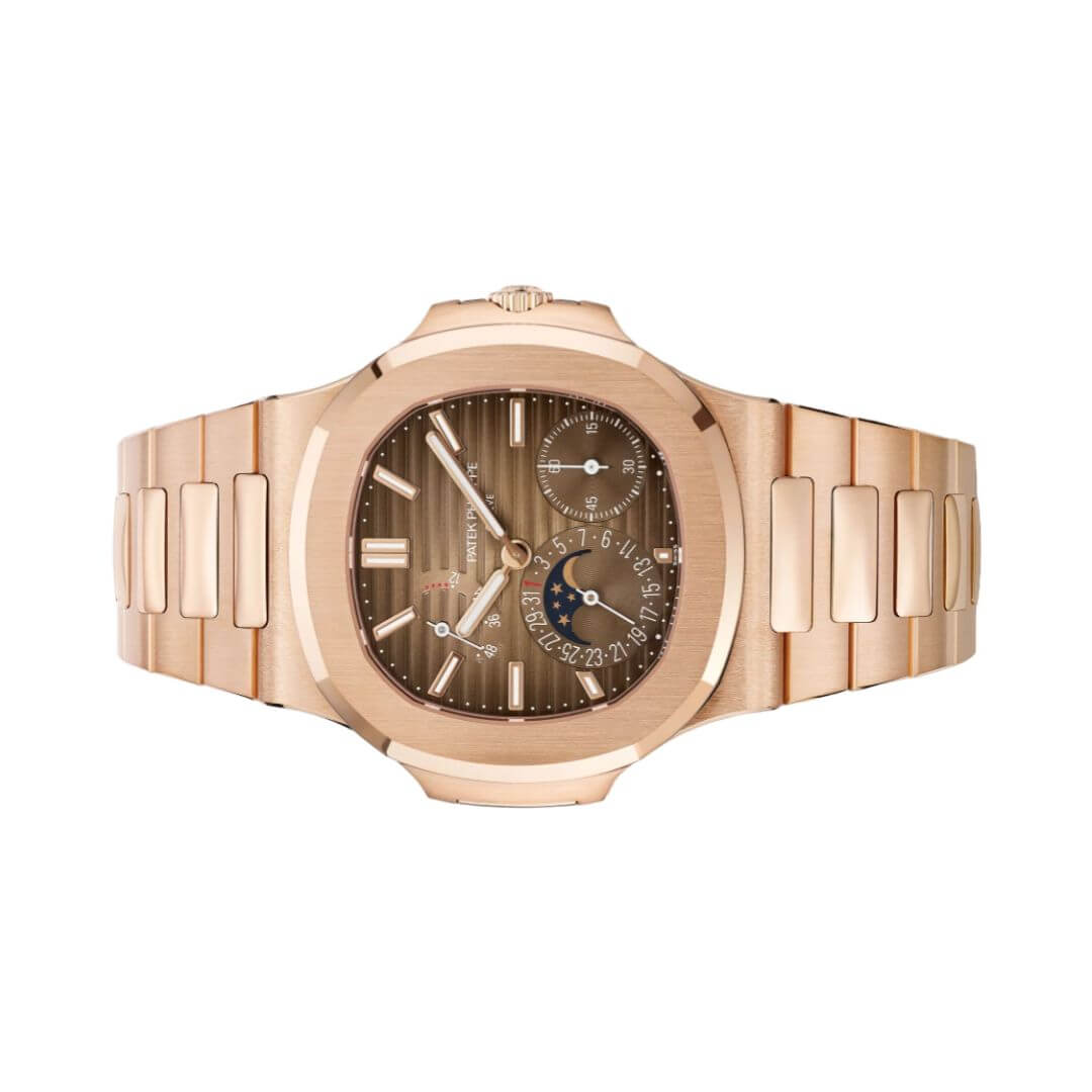 https://cdn.shopify.com/s/files/1/1016/2169/4801/files/Patek-Philippe-Nautilus-57121R-001-3.jpg?v=1770280035