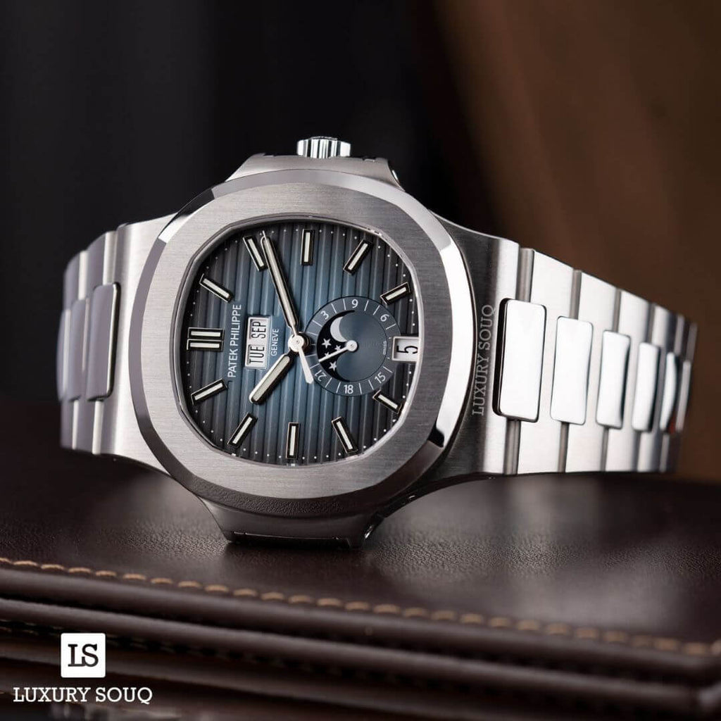 https://cdn.shopify.com/s/files/1/1016/2169/4801/files/Patek-Philippe-Nautilus-57261A-014-5.jpg?v=1770280111