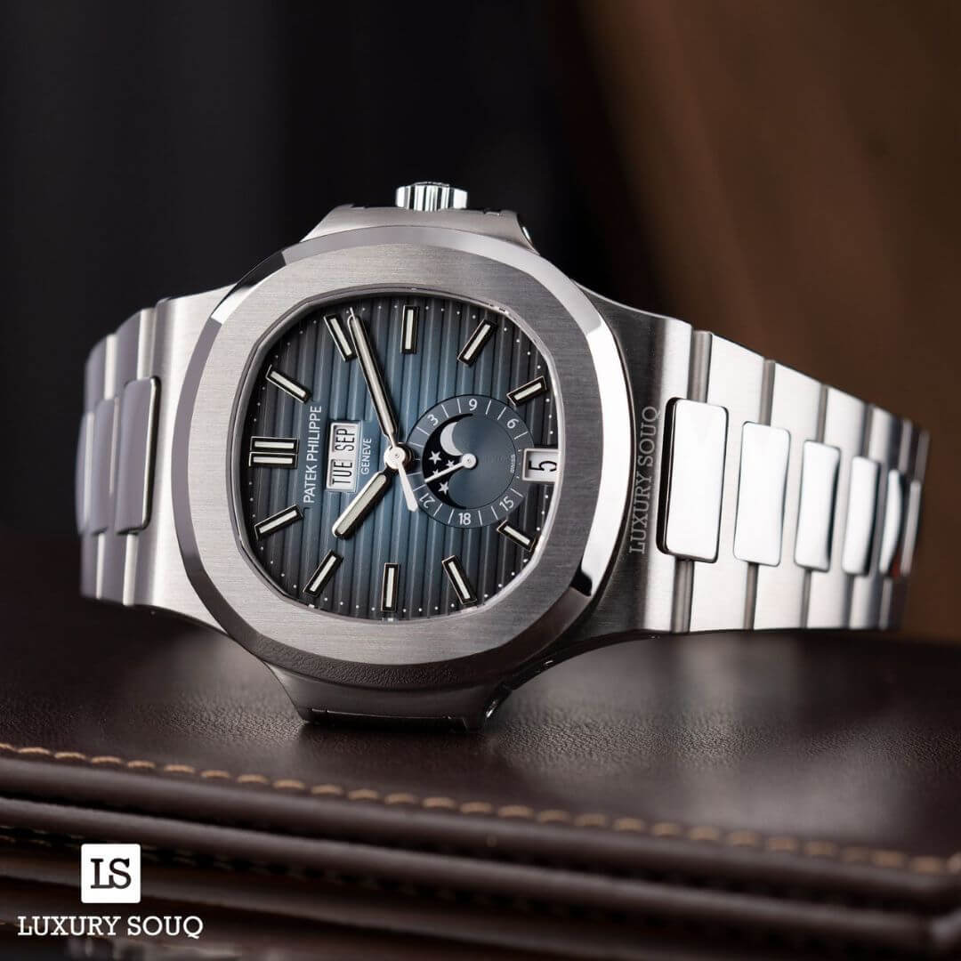 https://cdn.shopify.com/s/files/1/1016/2169/4801/files/Patek-Philippe-Nautilus-57261A-014-5.jpg?v=1770280111