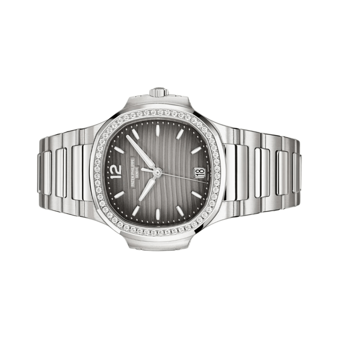 https://cdn.shopify.com/s/files/1/1016/2169/4801/files/Patek-Philippe-Nautilus-71181200A-011-1.png?v=1770279963