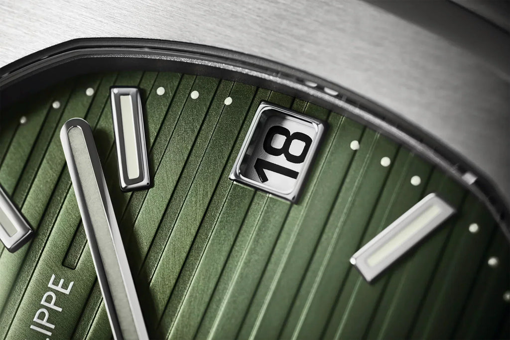 https://cdn.shopify.com/s/files/1/1016/2169/4801/files/Patek-phhilippe-5711a-green-2021-2copy.webp?v=1770280417