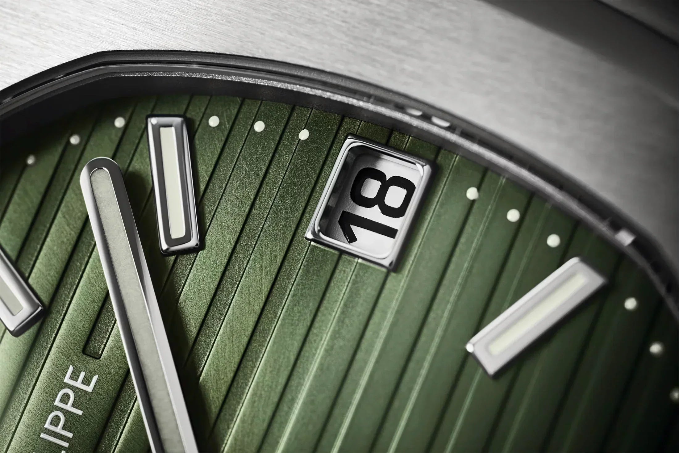 https://cdn.shopify.com/s/files/1/1016/2169/4801/files/Patek-phhilippe-5711a-green-2021-2copy.webp?v=1770280417