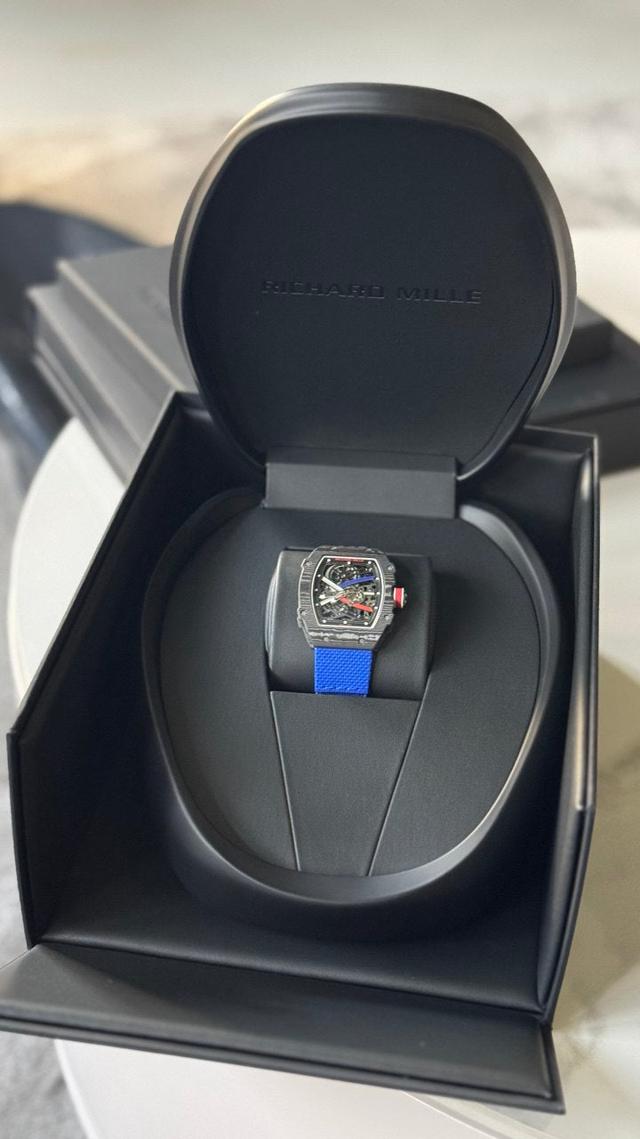 https://cdn.shopify.com/s/files/1/1016/2169/4801/files/Richard_Mille_RM_6702_S_bastien_Ogier_Black_Carbon_TPT.jpg?v=1770280397
