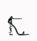 https://cdn.shopify.com/s/files/1/0648/4253/0893/files/SaintLaurentBlackOpyumSandals11.jpg?v=1762887532