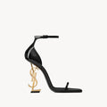 https://cdn.shopify.com/s/files/1/0648/4253/0893/files/SaintLaurentOpyumSandal.jpg?v=1762887530