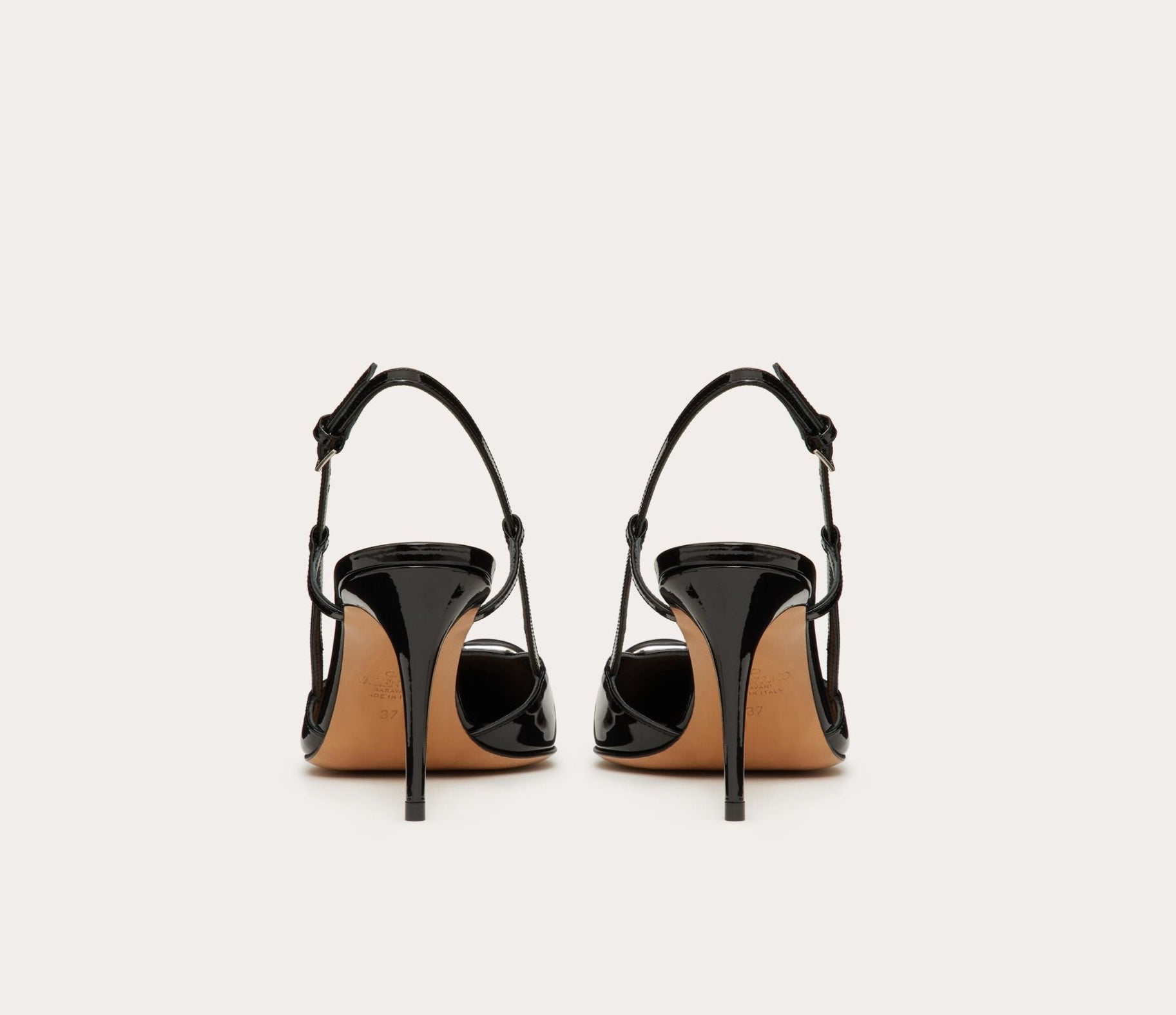 https://cdn.shopify.com/s/files/1/0648/4253/0893/files/ValentinoBlackLaceUpHeels_5.jpg?v=1762887546