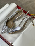 https://cdn.shopify.com/s/files/1/0648/4253/0893/files/ValentinoSilverHeels_2.jpg?v=1762887552