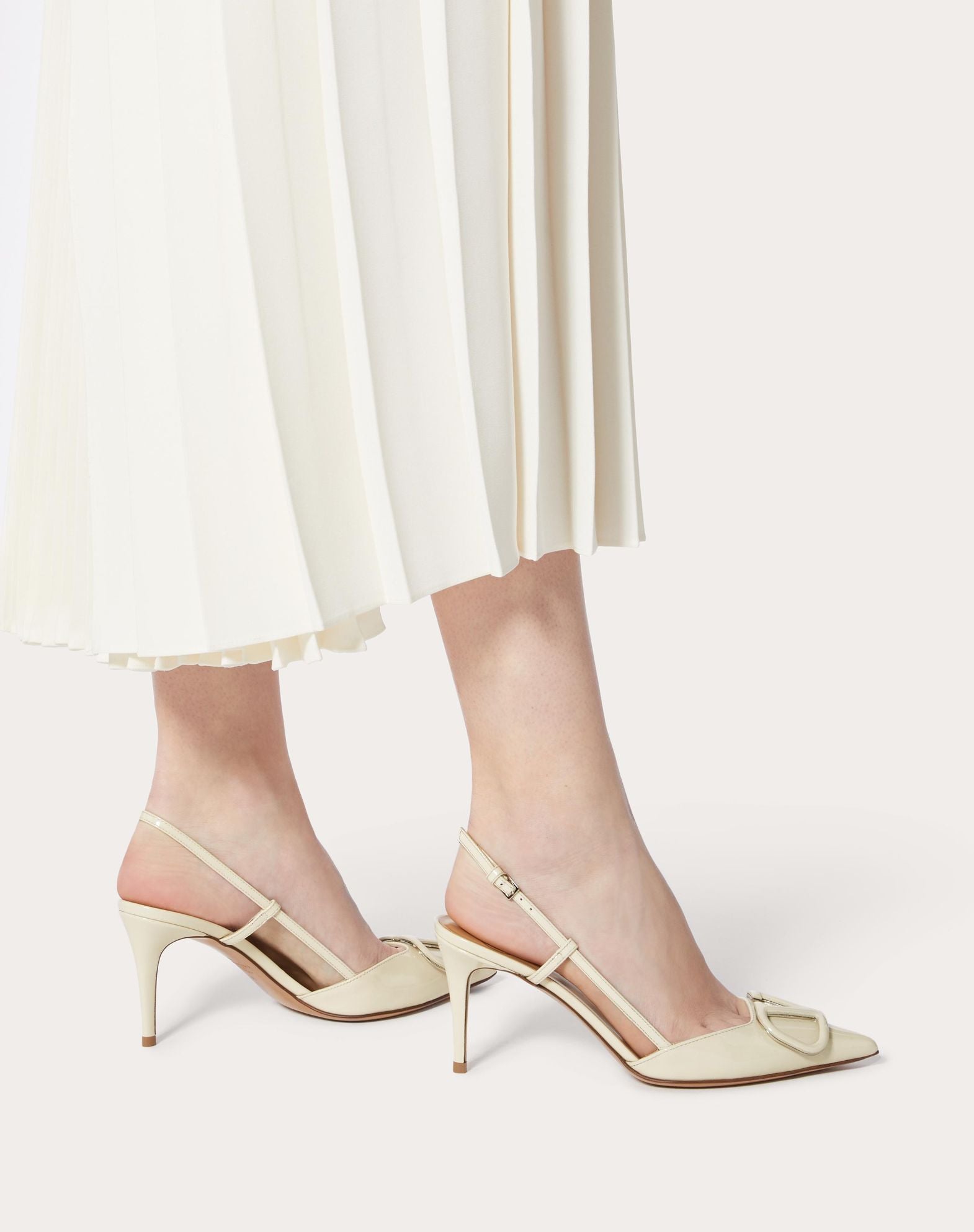 https://cdn.shopify.com/s/files/1/0648/4253/0893/files/ValentinoWhiteLaceUpHeels_1.jpg?v=1762887547
