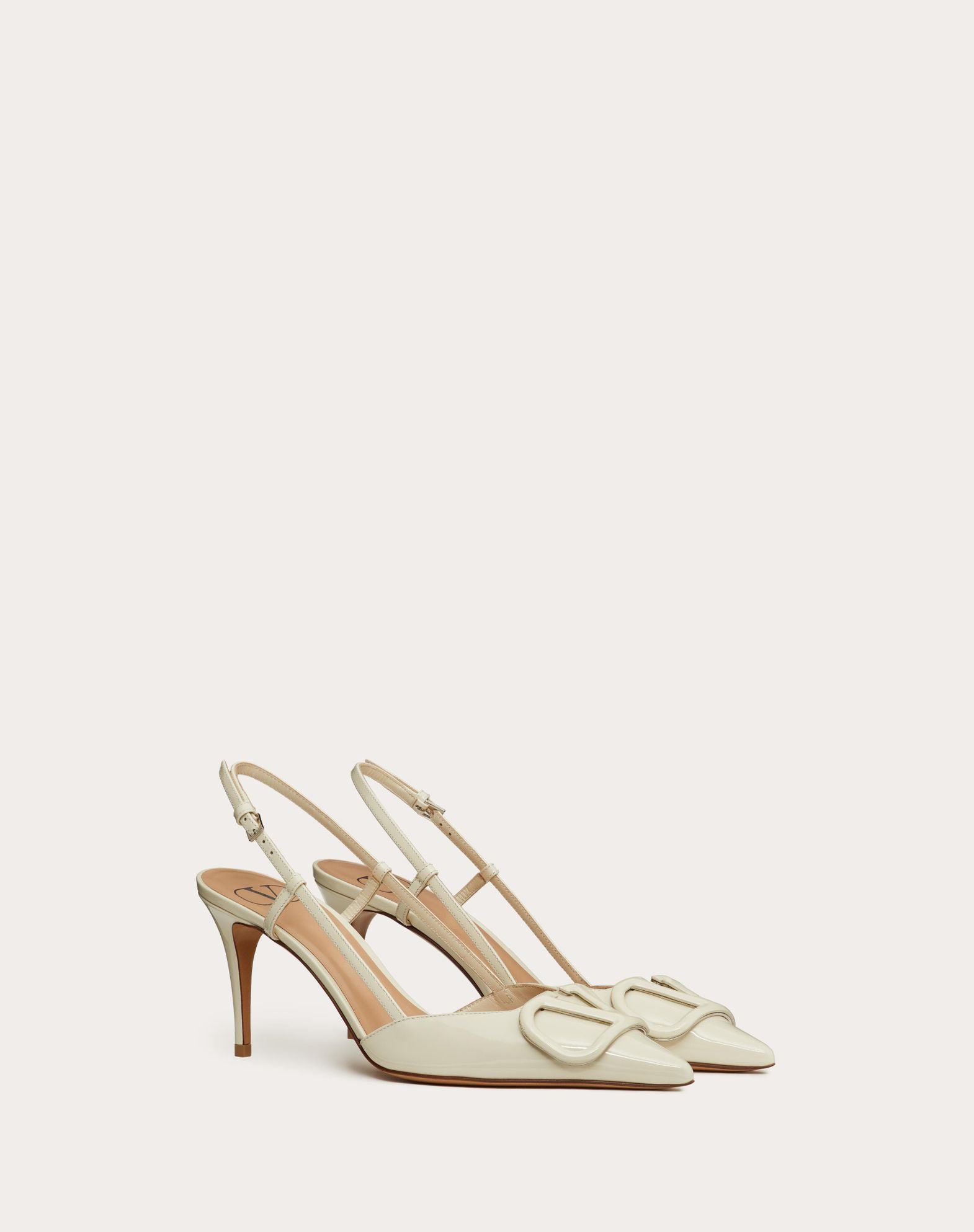 https://cdn.shopify.com/s/files/1/0648/4253/0893/files/ValentinoWhiteLaceUpHeels_3.jpg?v=1762887546