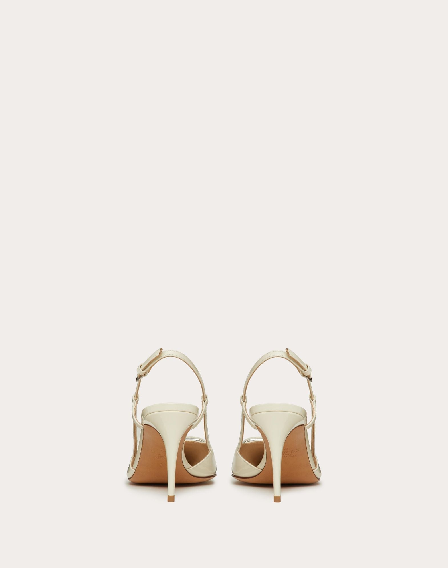 https://cdn.shopify.com/s/files/1/0648/4253/0893/files/ValentinoWhiteLaceUpHeels_4.jpg?v=1762887547