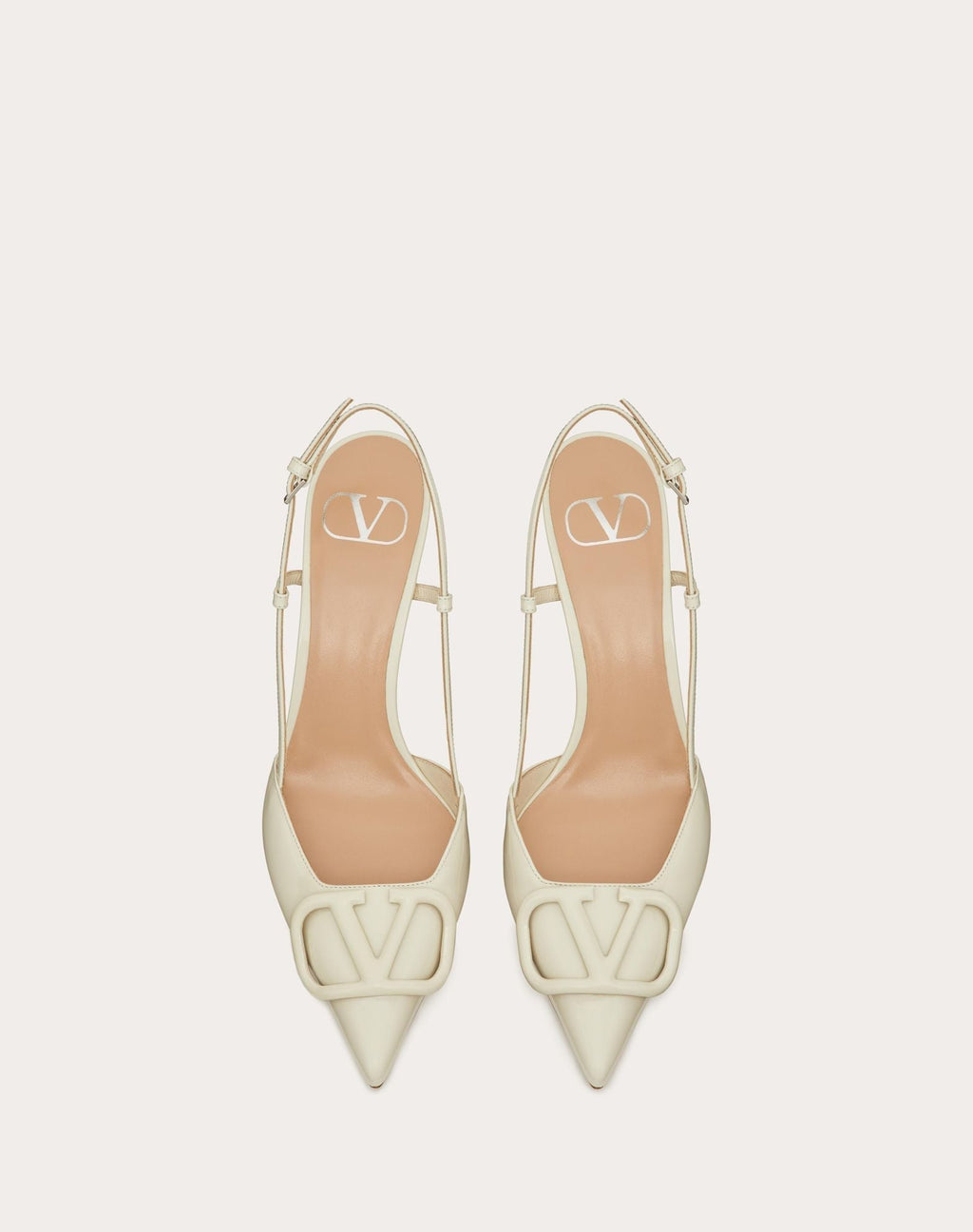 https://cdn.shopify.com/s/files/1/0648/4253/0893/files/ValentinoWhiteLaceUpHeels_5.jpg?v=1762887546