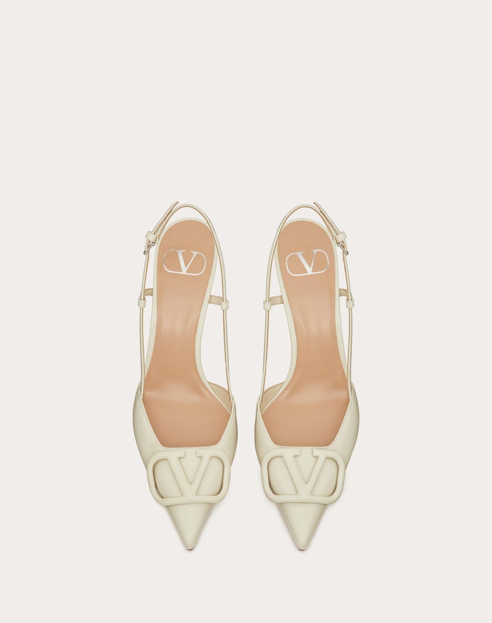 https://cdn.shopify.com/s/files/1/0648/4253/0893/files/ValentinoWhiteLaceUpHeels_5.jpg?v=1762887546
