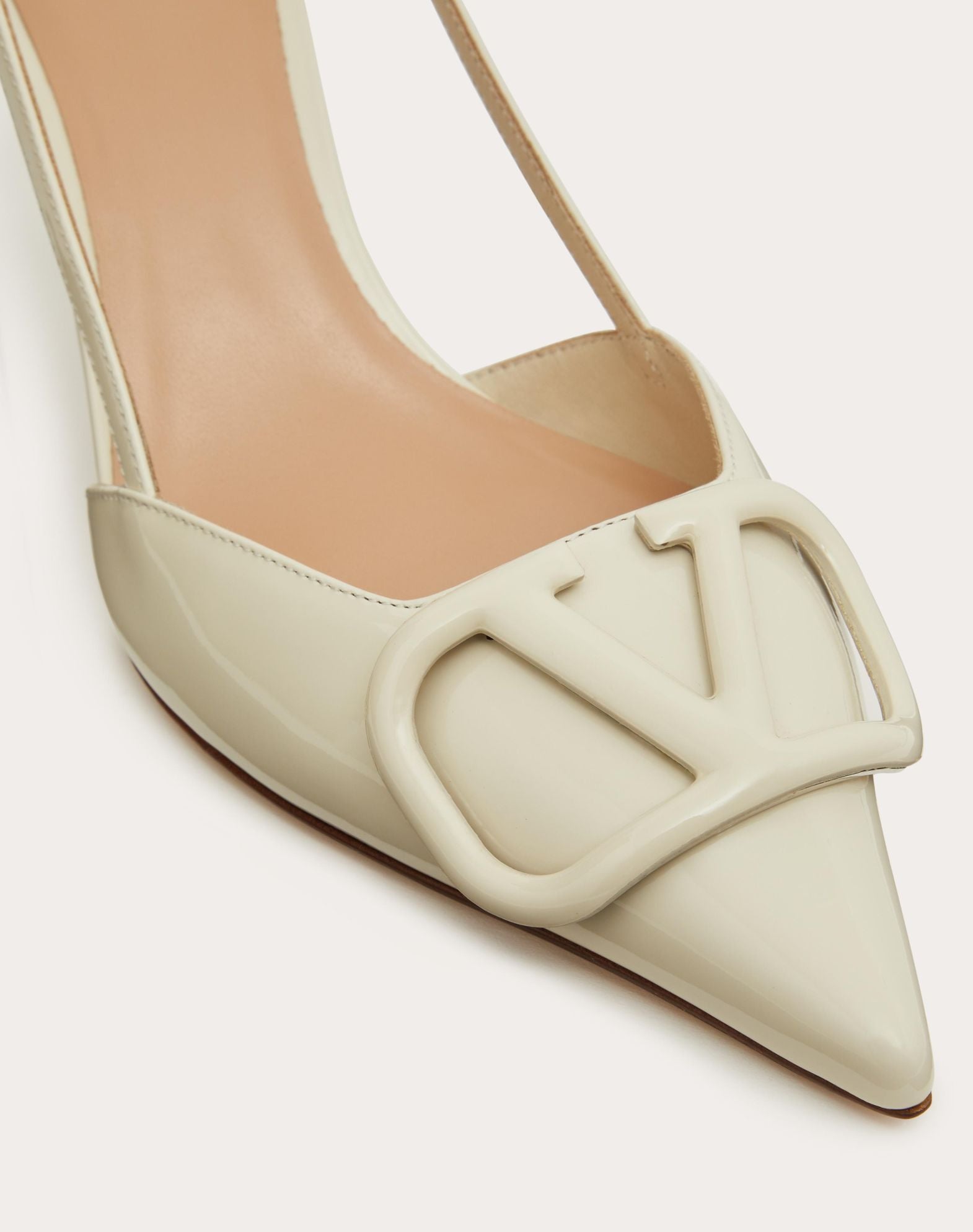 https://cdn.shopify.com/s/files/1/0648/4253/0893/files/ValentinoWhiteLaceUpHeels_6.jpg?v=1762887547