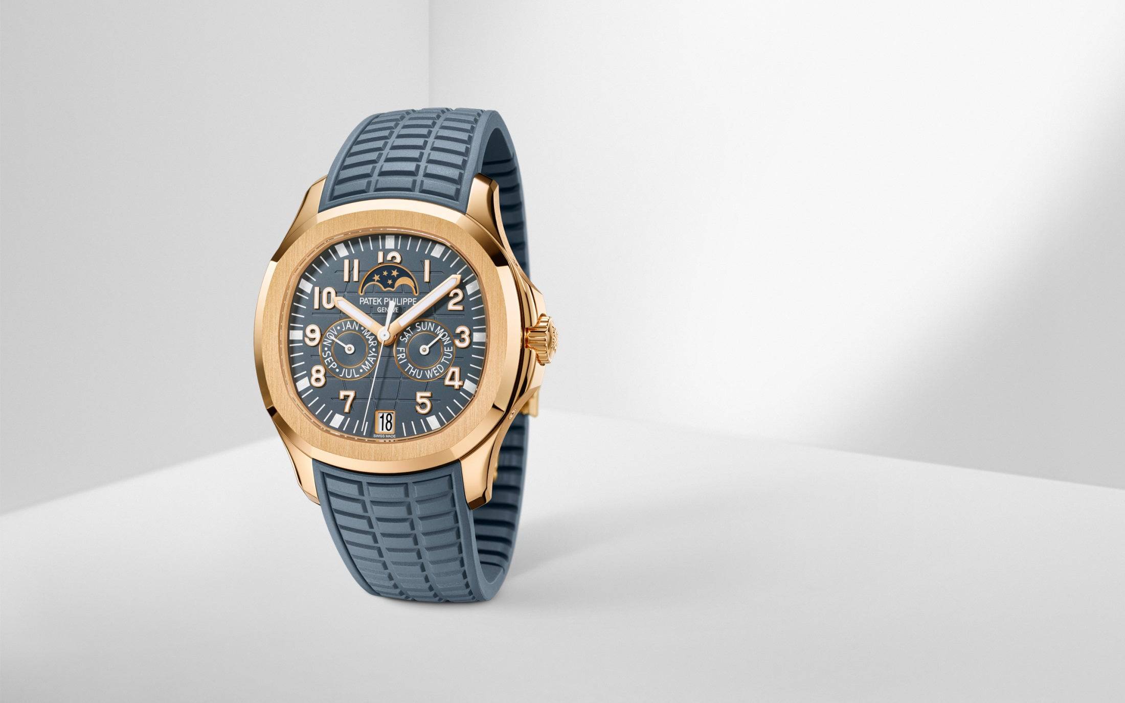 https://cdn.shopify.com/s/files/1/1016/2169/4801/files/dubailuxurywatch-luxury-watches-default-title-patek-philippe-aquanaut-5261r-001-rose-gold-moon-phase-annual-calendar-47452789309715.jpg?v=1770280435