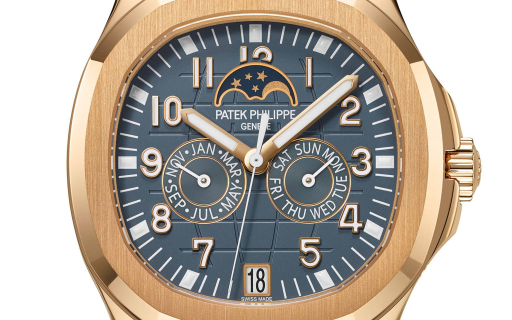 https://cdn.shopify.com/s/files/1/1016/2169/4801/files/dubailuxurywatch-luxury-watches-default-title-patek-philippe-aquanaut-5261r-001-rose-gold-moon-phase-annual-calendar-47468691521811.jpg?v=1770280434