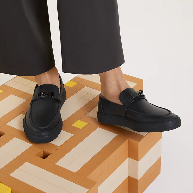 https://cdn.shopify.com/s/files/1/0626/8095/7046/files/game-slip-on-sneaker--241850ZH03-worn-2-0-0-800-800_g.webp?v=1755336945