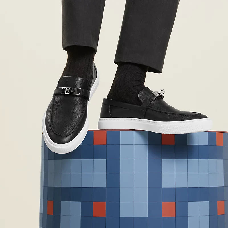 https://cdn.shopify.com/s/files/1/0626/8095/7046/files/game-slip-on-sneaker--242854ZH01-worn-2-0-0-800-800_g.webp?v=1755337188