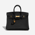 https://cdn.shopify.com/s/files/1/0648/4253/0893/files/hermes-birkin-25-togo-black-ghw-front.jpg?v=1762886820