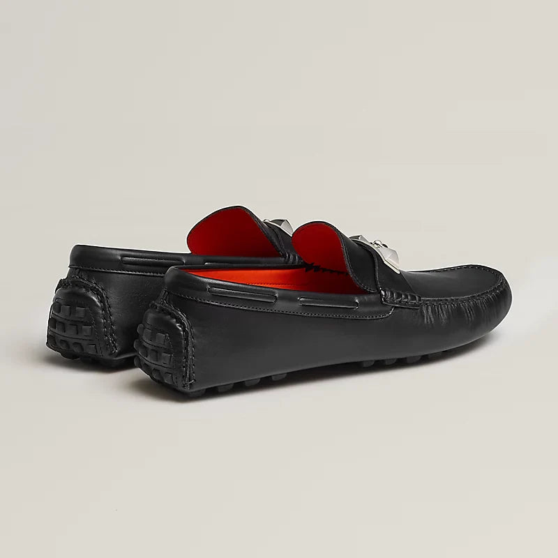 https://cdn.shopify.com/s/files/1/0626/8095/7046/files/irving-loafer--141251ZH02-worn-5-0-0-800-800_g.webp?v=1755336080