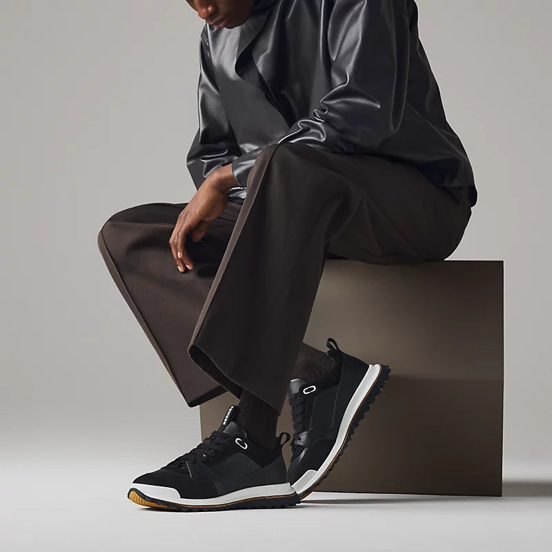 https://cdn.shopify.com/s/files/1/0648/4253/0893/files/leader-sneaker--252864ZH01-worn-3-0-0-800-800_g.webp?v=1762887968