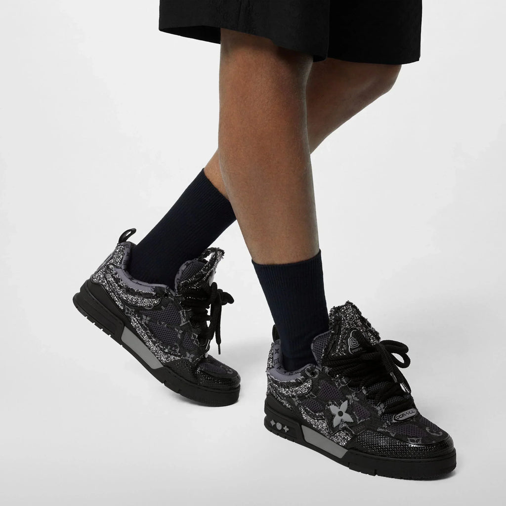 https://cdn.shopify.com/s/files/1/0648/4253/0893/files/louis-vuitton-lv-skate-sneaker-swarovski-crystals-monogram-denim-black-1abmhz-scaled.webp?v=1762887594