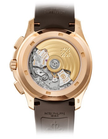 https://cdn.shopify.com/s/files/1/1016/2169/4801/files/patek-philippe-5968r-aquanaut-self-winding-dubailuxurywatch-7.jpg?v=1770280431